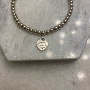 Tiffany & Co. Beaded bracelet with heart pendant